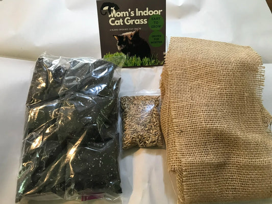 10' x 10' cat grass tray refill pack open showing content